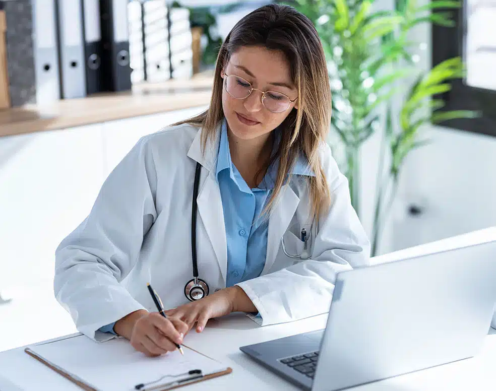doctor taking notes about data doctor taking notes about data